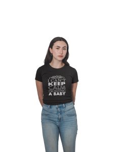 I'm having a baby-printed family themed cotton blended half-sleeve t-shirts made for women (black)