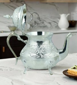 Shining silver brass metal vintage teapot for dining table, center table and kitchen